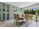 Stylish dining room with custom cabinets, modern lighting, and seating for six at 6467 E Sierra Vista Dr, Paradise Valley, AZ 85253