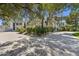Long private driveway leading to a luxury estate with lush landscaping at 6467 E Sierra Vista Dr, Paradise Valley, AZ 85253