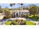 Expansive estate featuring circular driveway, mature landscaping, water feature, and mountain views at 6467 E Sierra Vista Dr, Paradise Valley, AZ 85253