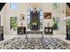 Elegant foyer with a decorative table, stylish cabinets, and a chandelier at 6467 E Sierra Vista Dr, Paradise Valley, AZ 85253