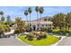 Stunning exterior with palm trees, meticulously landscaped grounds and a circular driveway at 6467 E Sierra Vista Dr, Paradise Valley, AZ 85253