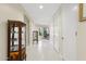 Bright hallway features decorative display cases and leads to other rooms at 6467 E Sierra Vista Dr, Paradise Valley, AZ 85253