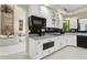 Bright kitchen with stainless appliances, granite counters, and views into the home at 6467 E Sierra Vista Dr, Paradise Valley, AZ 85253