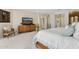 Large main bedroom with sitting area, ornate dresser, and arched entryway at 6467 E Sierra Vista Dr, Paradise Valley, AZ 85253