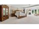 Expansive main bedroom with elegant furnishings, fireplace, and outside access at 6467 E Sierra Vista Dr, Paradise Valley, AZ 85253