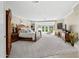 Spacious main bedroom with sitting area, fireplace and outside access at 6467 E Sierra Vista Dr, Paradise Valley, AZ 85253