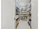 Well-organized walk-in pantry with ample shelving for storage of kitchen essentials at 6467 E Sierra Vista Dr, Paradise Valley, AZ 85253