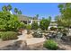 Beautiful backyard showcasing a freeform pool, spa, and lush landscaping, creating a private oasis at 6467 E Sierra Vista Dr, Paradise Valley, AZ 85253