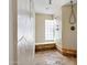 Luxurious walk-in shower with stone walls, tiled floors and a glass block window allowing natural light at 6467 E Sierra Vista Dr, Paradise Valley, AZ 85253