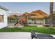Play structure and trampoline in the backyard with mountain views at 7100 N 47Th St, Paradise Valley, AZ 85253