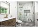 Elegant bathroom with a glass-enclosed shower and modern fixtures at 7100 N 47Th St, Paradise Valley, AZ 85253