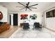 Spacious main bedroom with seating area, stylish rug and decor, and bright natural light at 7100 N 47Th St, Paradise Valley, AZ 85253