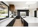 Modern kitchen with sleek countertops, ample storage, and stylish appliances at 7100 N 47Th St, Paradise Valley, AZ 85253