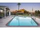 Backyard pool with mountain views and play area; ideal for Gathering fun at 7100 N 47Th St, Paradise Valley, AZ 85253