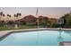 Sparkling swimming pool and mountain views creates an inviting backyard experience at 7100 N 47Th St, Paradise Valley, AZ 85253