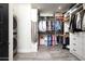 Custom walk-in closet with ample storage, modern organization, and designer finishes at 7100 N 47Th St, Paradise Valley, AZ 85253