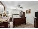 Bedroom with a traditional bed, dresser, and a ceiling fan at 7354 E San Miguel Ave, Scottsdale, AZ 85250