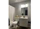 Well-lit bathroom with a shower-tub combo and modern vanity offering practical space at 742 S Los Alamos --, Mesa, AZ 85204