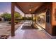 Outdoor patio showing the beautiful backyard, putting green, and desert landscape at 7547 E Mary Sharon Dr, Scottsdale, AZ 85266