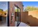Luxurious outdoor shower with multiple shower heads and easy access to the main bathroom at 7547 E Mary Sharon Dr, Scottsdale, AZ 85266