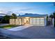 Charming home with modern garage door, desert landscaping, and inviting curb appeal at 7646 E Catalina Dr, Scottsdale, AZ 85251