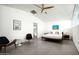 Bright main bedroom with neutral tones, modern decor, and ensuite bath entrance at 7646 E Catalina Dr, Scottsdale, AZ 85251