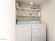 Laundry room features a stacked washer and dryer at 7684 E Minnezona Ave, Scottsdale, AZ 85251
