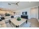 Open-concept living area with a modern design, seamless flow, and stylish decor at 8035 E Paloma Ave, Mesa, AZ 85212
