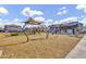 This community playground has swings, slides and climbing equipment with multiple places for families to sit and relax at 8035 E Paloma Ave, Mesa, AZ 85212