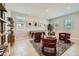 Recreational room with a pool table, seating area, and bright natural lighting at 8142 E Petra Ave, Mesa, AZ 85212
