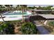 Relaxing pool area with lounge chairs and covered seating, perfect for enjoying sunny days in style at 8142 E Petra Ave, Mesa, AZ 85212