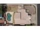A bird's eye view showcases the home's pool and well-maintained tile roof at 8469 W Emile Zola Ave, Peoria, AZ 85381