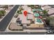 An elevated view of the home with a pool and desert landscaping at 8469 W Emile Zola Ave, Peoria, AZ 85381