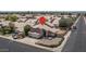 An aerial view of the home in a desirable neighborhood with mature landscaping at 8469 W Emile Zola Ave, Peoria, AZ 85381