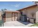 Backyard shed with an air conditioning unit for storage at 8469 W Emile Zola Ave, Peoria, AZ 85381