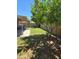 Well-maintained backyard featuring a covered patio and grass at 909 W Mesquite St, Chandler, AZ 85225