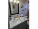 Well-lit bathroom featuring a modern sink and decorative accents at 909 W Mesquite St, Chandler, AZ 85225