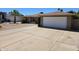Charming single story home featuring a spacious driveway with a two car garage at 909 W Mesquite St, Chandler, AZ 85225
