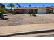 Charming single story home with desert landscaping and mature palm trees in front yard at 909 W Mesquite St, Chandler, AZ 85225
