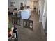 Open concept kitchen with an island and stainless steel appliances at 909 W Mesquite St, Chandler, AZ 85225