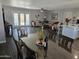 Open-concept living room and dining area featuring modern wood-look floors at 909 W Mesquite St, Chandler, AZ 85225