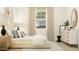 Serene bedroom with a large bed and stylish dresser creates a comforting retreat at 919 W Peralta Pass, Apache Junction, AZ 85120