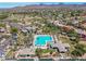 Aerial view of a sparkling community pool and recreation center, an ideal spot for relaxation and fun at 9571 N 117Th St, Scottsdale, AZ 85259