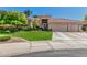 Charming single-story home featuring a three-car garage, mature landscaping, and inviting curb appeal at 9571 N 117Th St, Scottsdale, AZ 85259