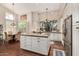 Spacious kitchen featuring custom cabinets, granite countertops, stainless steel appliances, and breakfast nook at 9571 N 117Th St, Scottsdale, AZ 85259