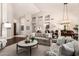 Bright and open living space featuring soaring ceilings, abundant natural light, and elegant decor at 9571 N 117Th St, Scottsdale, AZ 85259