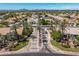 Aerial view of a Tradewinds community featuring well-maintained streets and lush landscaping at 9571 N 117Th St, Scottsdale, AZ 85259