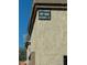 Exterior building sign showing address numbers at 97 N Cooper Rd # 97, Chandler, AZ 85225