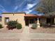 Charming home with desert landscaping, a terracotta roof, and a welcoming front porch at 97 N Cooper Rd # 97, Chandler, AZ 85225