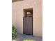 Exterior shot of a gate leading to a patio at 97 N Cooper Rd # 97, Chandler, AZ 85225